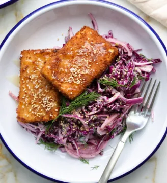 Crispy tofu cutlets with fennel and apple slaw and herby probiotic ranch.